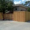 8' cedar fence with custom iron slide gate